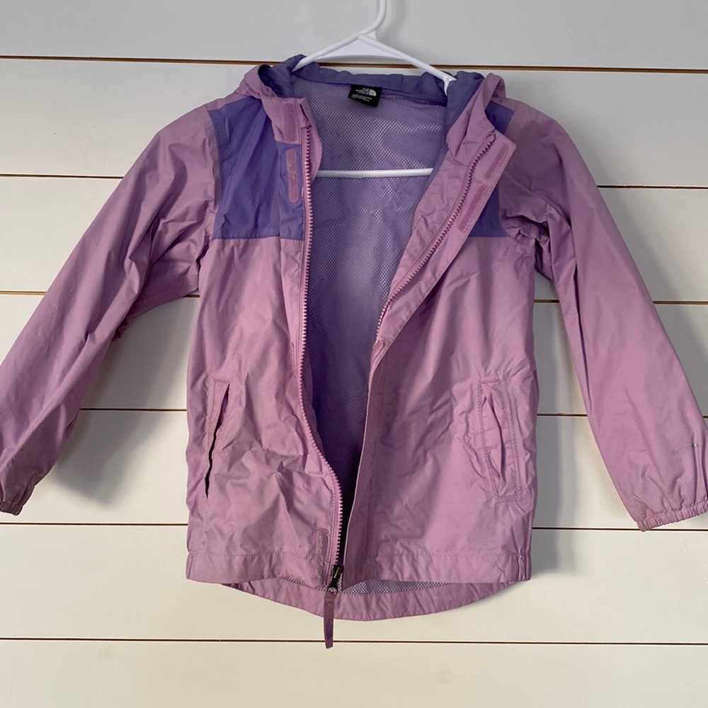 Purple/lavender The North Face Rain Jacket with hood.  Youth size 6